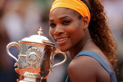 PARIS, FRANCE - JUNE 08:  Serena Williams of United States of America poses with the Coupe Suzanne Lenglen after victory in the Women's Singles Final match against Maria Sharapova of Russia  during day fourteen of French Open at Roland Garros on June 8, 2013 in Paris, France.  (Photo by Clive Brunskill/Getty Images)
