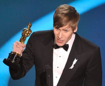 LOS ANGELES, CA - FEBRUARY 22:  (EDITORS NOTE: NO ONLINE, NO INTERNET, EMBARGOED FROM INTERNET AND TELEVISION USAGE UNTIL THE CONCLUSION OF THE LIVE OSCARS TELECAST)  Screenwriter Dustin Lance Black receives his Best Original Screenplay award for "Milk" during the 81st Annual Academy Awards held at Kodak Theatre on February 22, 2009 in Los Angeles, California.  (Photo by Kevin Winter/Getty Images)