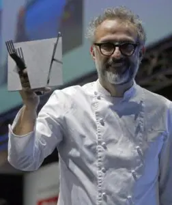 epa05129431 Italian three-Michelin-star chef Massimo Bottura holds his award to the European Chef of the Year 2016, for his social work at the Milan Expo where he created a meal center in which they cooked with leftovers from the Pavilions, during the Madrid Fusion gastronomy held in Madrid, Spain, 27 January 2016.  EPA/J.J. Guillen