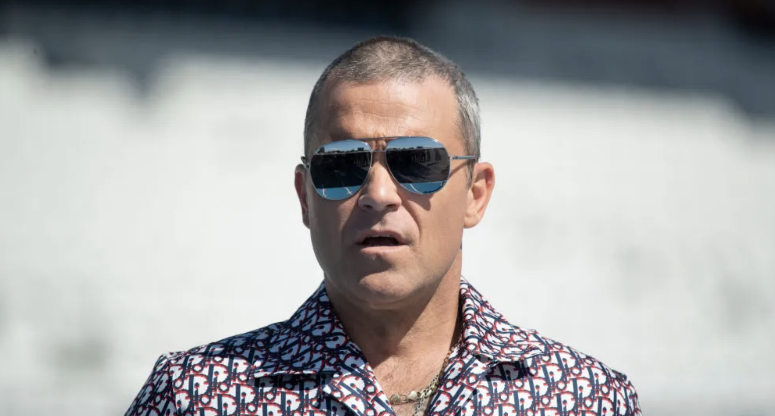 La confessione choc di Robbie Williams: «Un sicario voleva uccidermi»
